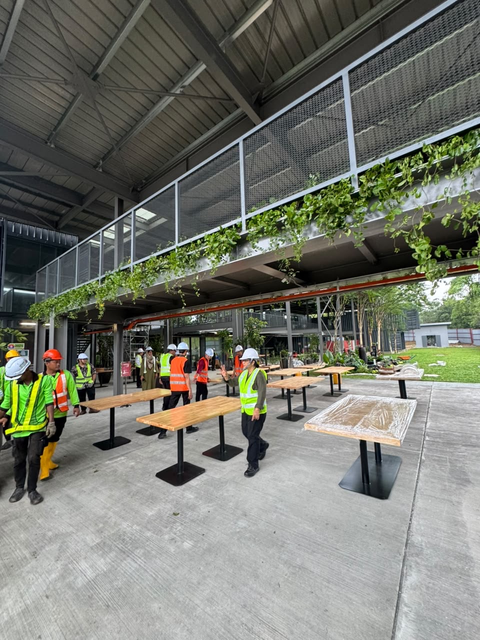 Dining tables during installation at PETRONAS Learning Centre