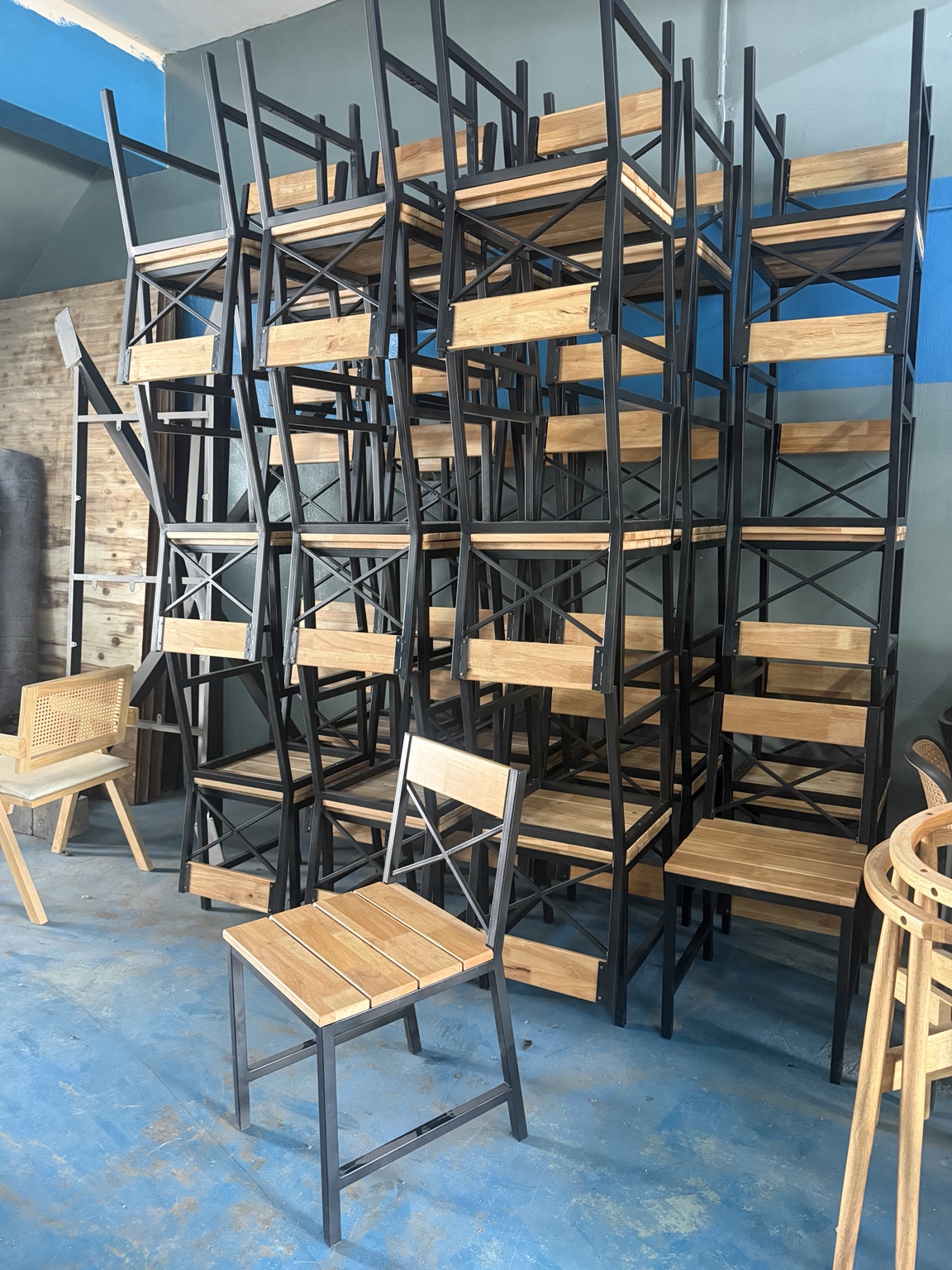 Wood and steel dining chairs prepared for delivery