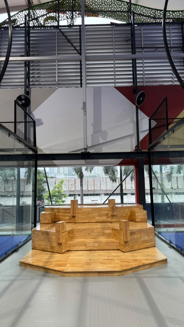 Custom cascading timber seating at Sports Garage PJ